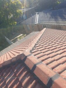 Before roof restoration Liverpool damaged tiled roof