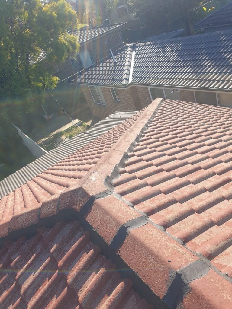 Before roof restoration Liverpool damaged tiled roof