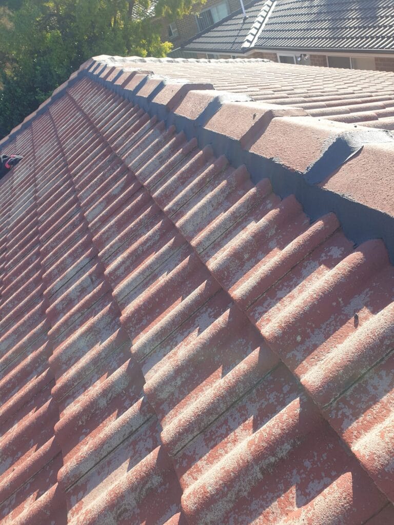 Before roof restoration Liverpool damaged tiled roof